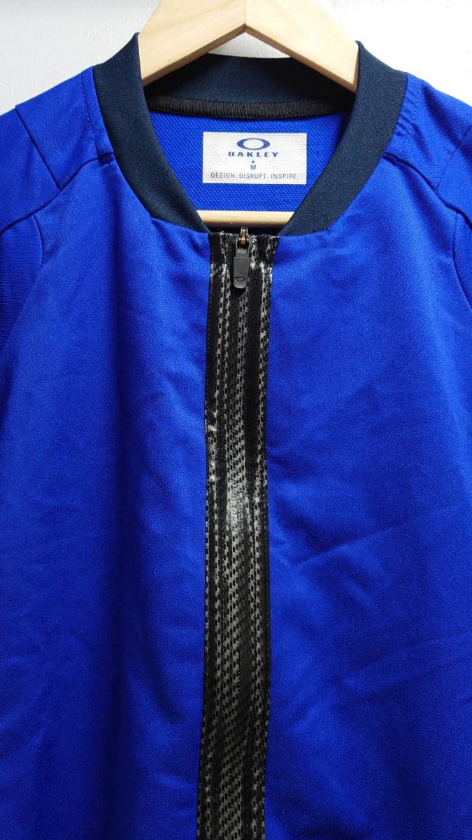 OAKLEY rib collar polyester jersey fitness jacket blue M stop water Zip Tec blouson Oacley 