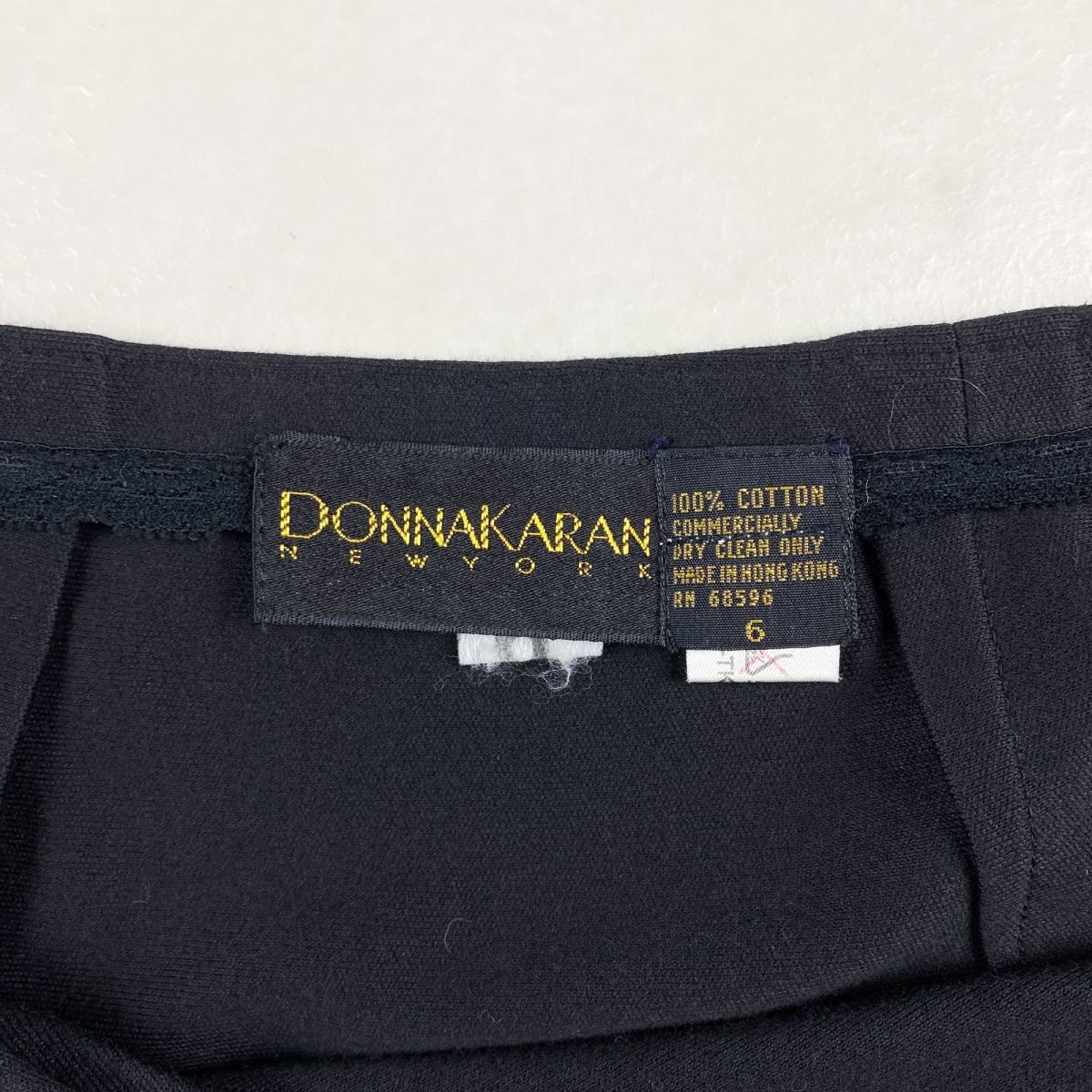 美品 DONNA KARAN ダナキャラン コットン アシンメトリーラップスカート 膝丈 裏地なし レディース ボトムス 黒 ブラック サイズ6*BC64_画像6