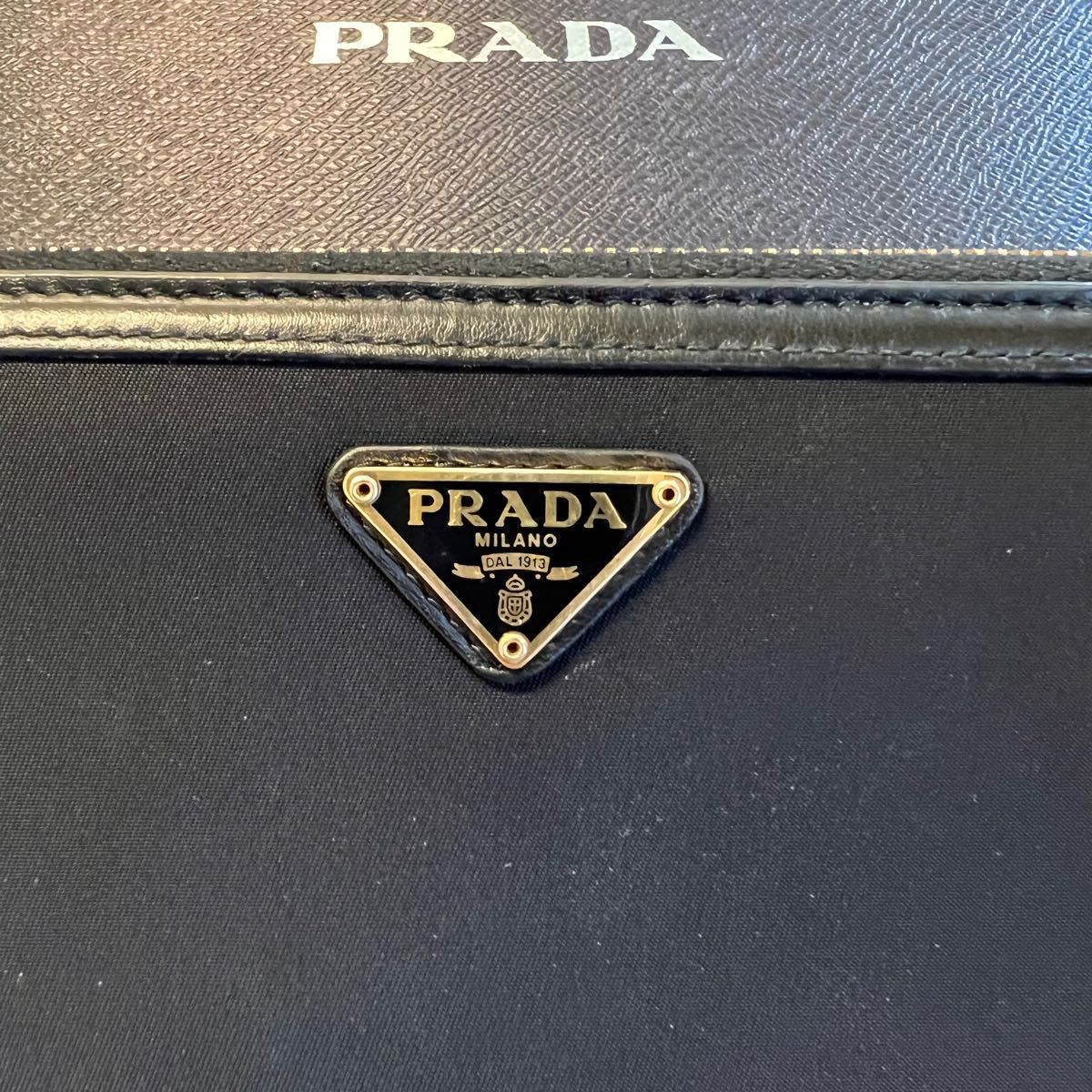新品同様 プラダ PRADA 財布 長財布 ナイロン ロゴ金具 ラウンド