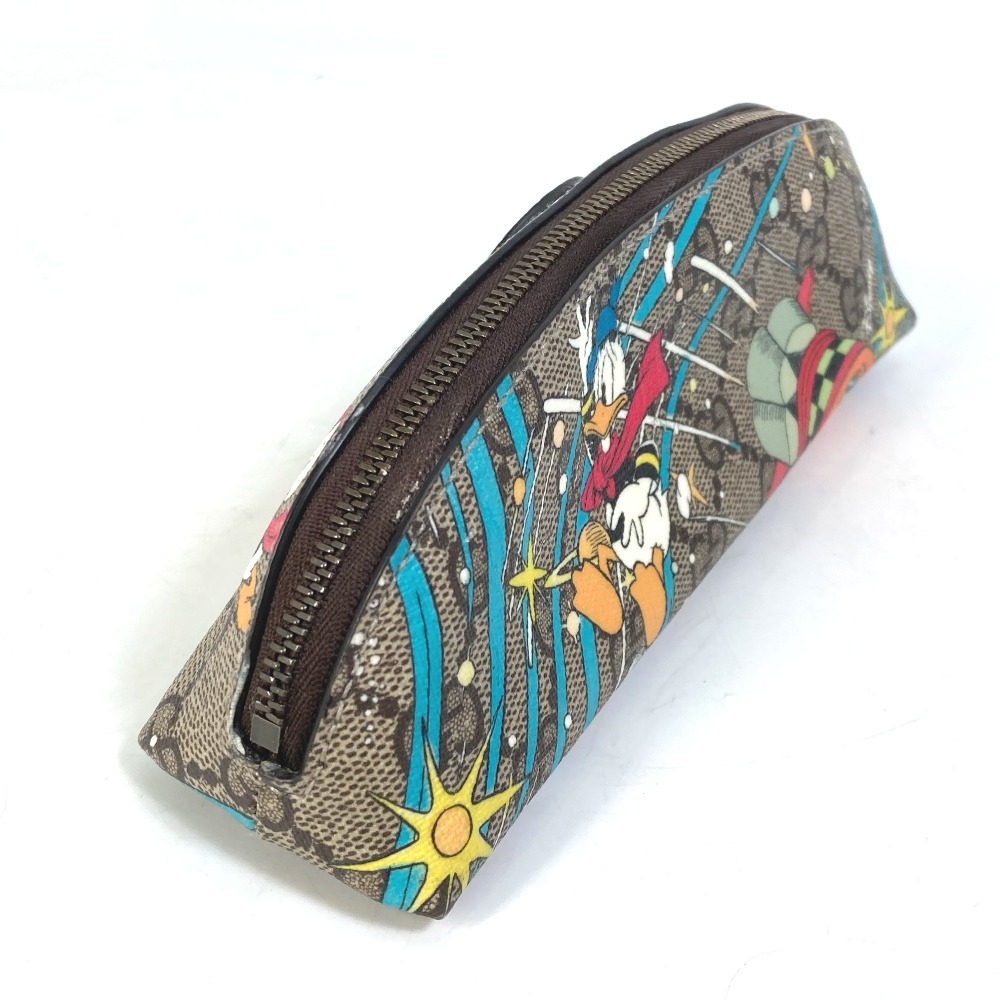 GUCCI Gucci 662129 Disney collaboration DISNEY Donald Duck GG writing brush box pouch GGs pulley m pen case PVC beige [ used ]