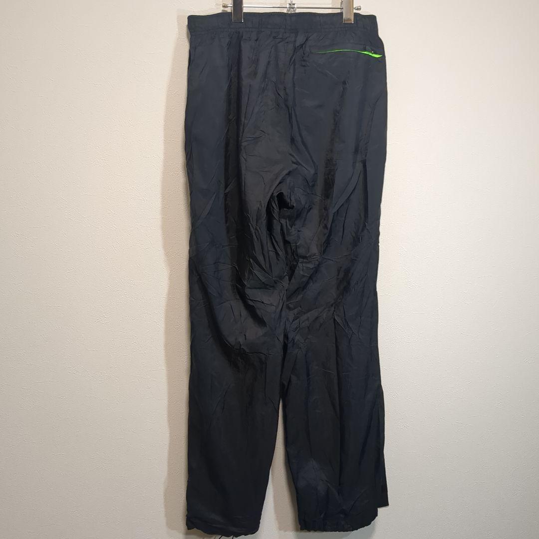 NIKE GOLFナイキゴルフ ジャージワイドパンツ 黒 ロゴ黄緑 NIKE GOLFナイキゴルフ ジャージワイドパンツ 黒 ロゴ黄緑
