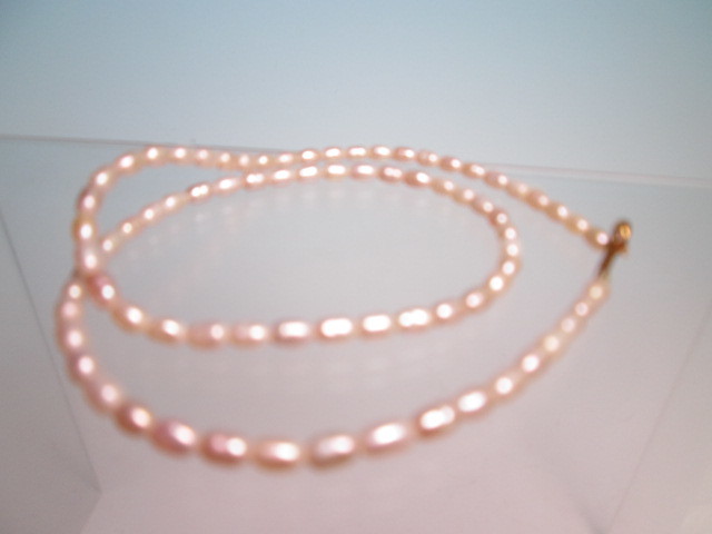 K18 fresh water pearl. necklace 