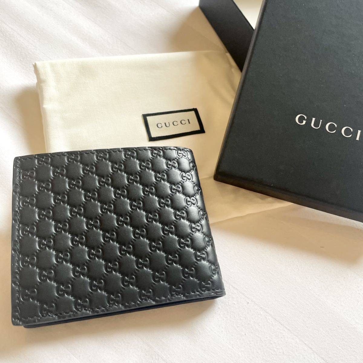 【新品】GUCCI グッチ マイクロGGシマ 二つ折り財布 小銭入れ付き 2つ折り財布 折財布 グッチシマ グッチメンズ 黒 ブラック_画像2