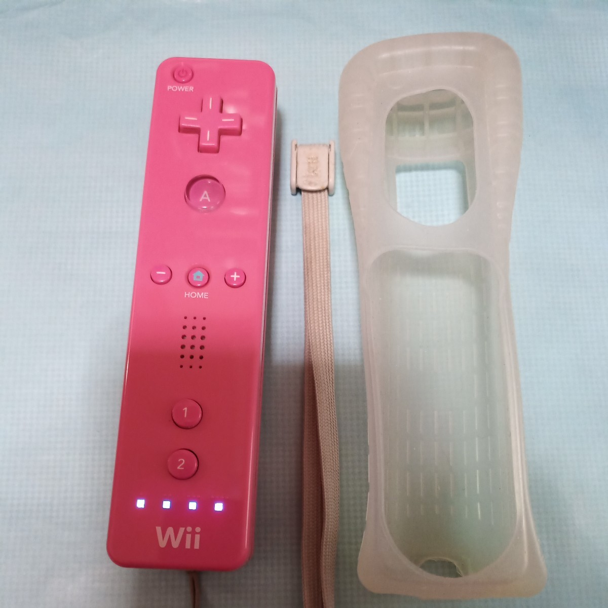 Wii remote control silicon cover button defect 