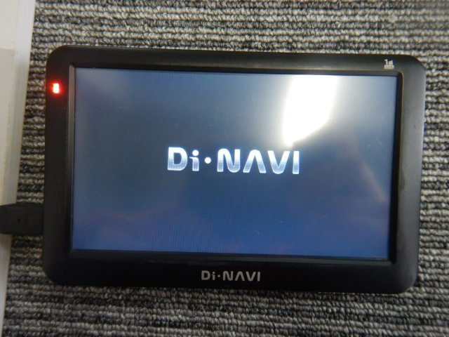 【23041216】Di・NAVI ポータブル メモリーナビ DNC-055A シガージャック仕様 土台付の画像1