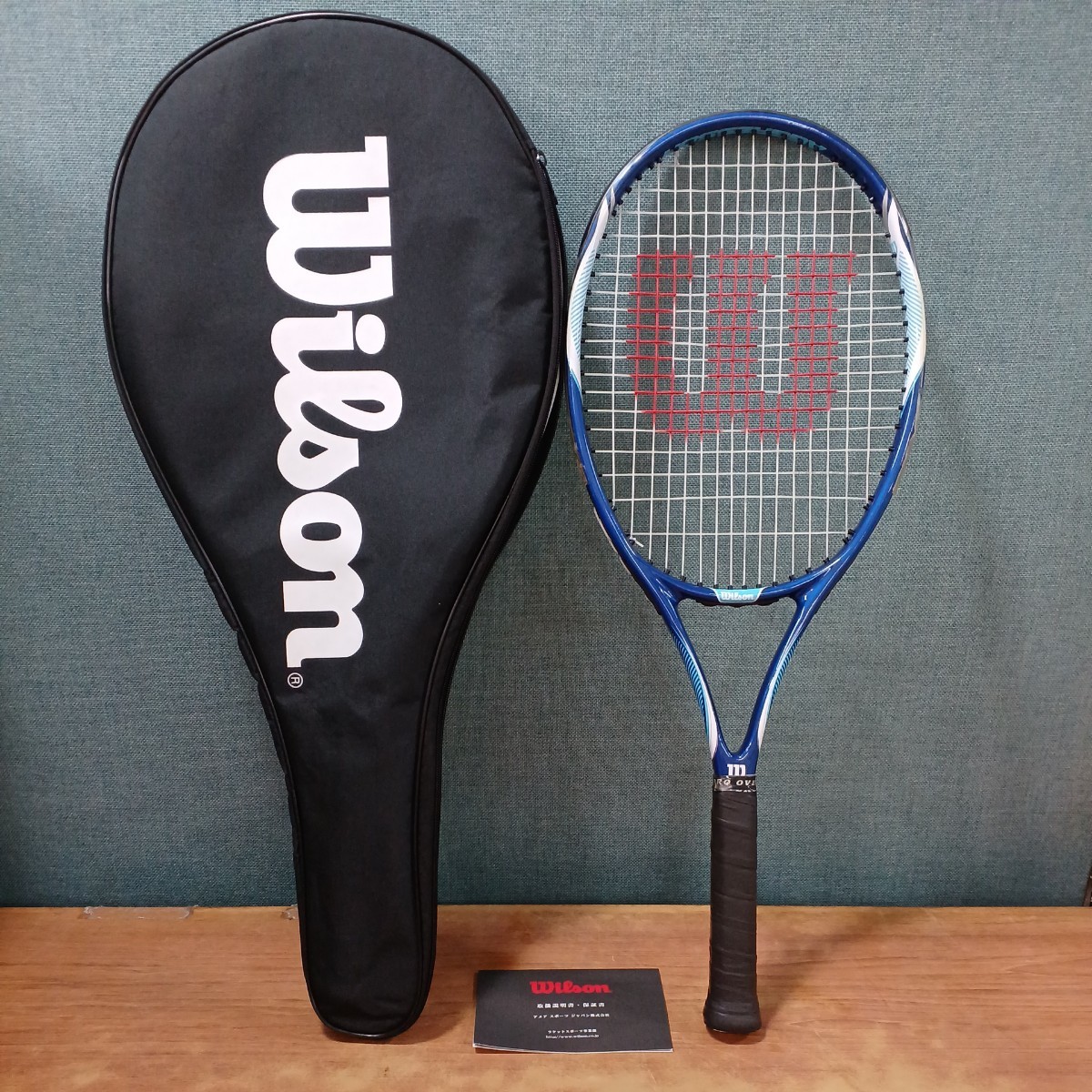 Wilson ウィルソン 硬式用テニスラケット AGGRESSOR100 ブルー系 269g ソフトケース入り アメアスポーツジャパン 中古 保管品 現状品 _画像1