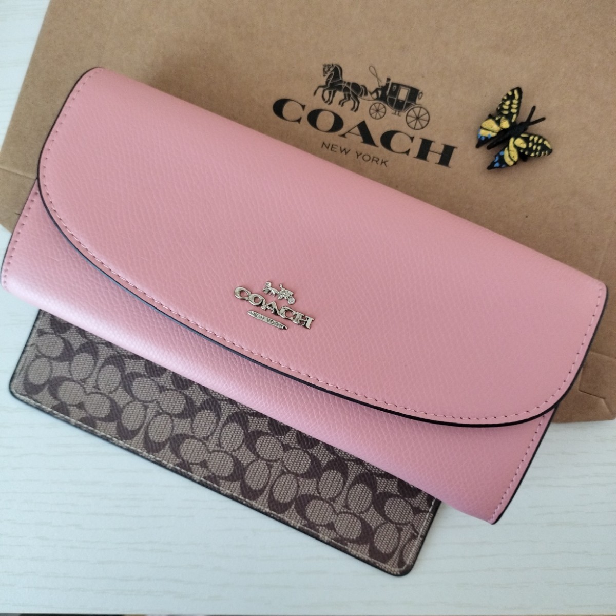 COACH コーチ長財布 ピンク　カーキ　ラグジュアリー　クロスグレーン　スリムエンベロープ　シグネチャー ポーチ　プレゼントおすすめ