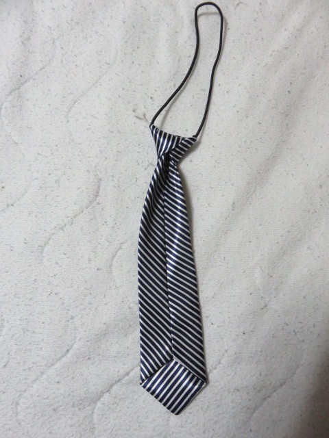  галстук детский темно-синий полоса цвет темно-синий полоса цвет полоса простой переустановка шея часть. часть. резина . переустановка . удобный. красивый. 