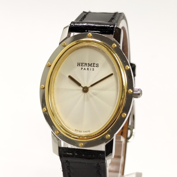 【中古】HERMES 腕時計 クリッパー オーバル レディース 腕時計 クオーツ SS レザー ブラック アイボリー文字盤 CO1.520 ?L