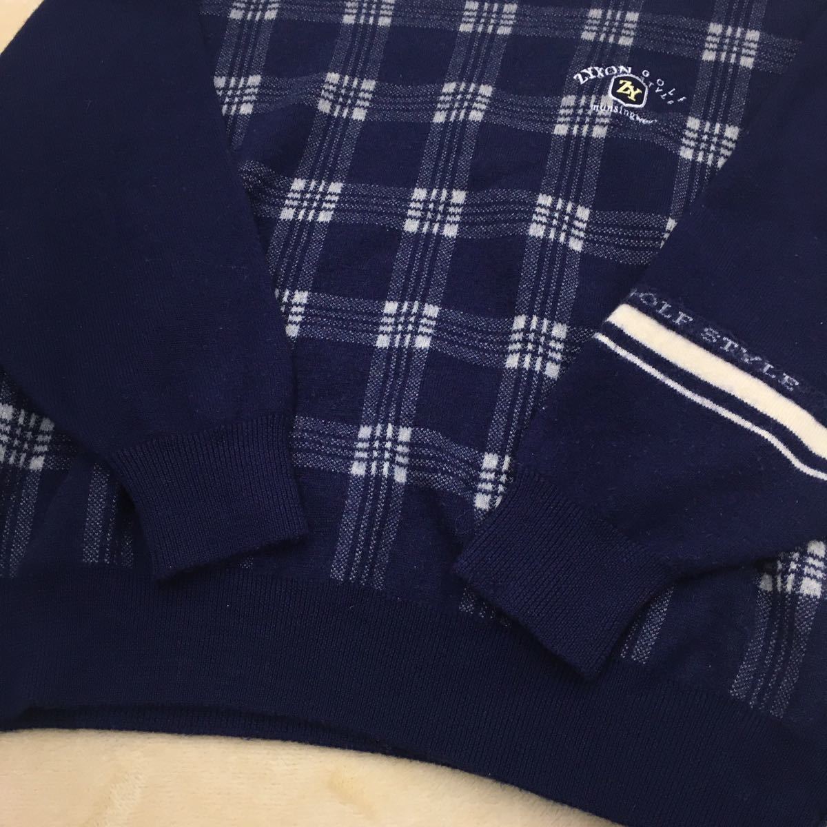 マンシングウェア ジグソン ゴルフスタイル スポーツウェア ニットセーター 切替デザイン チェック ウール メンズ サイズLL 紺色 デサント