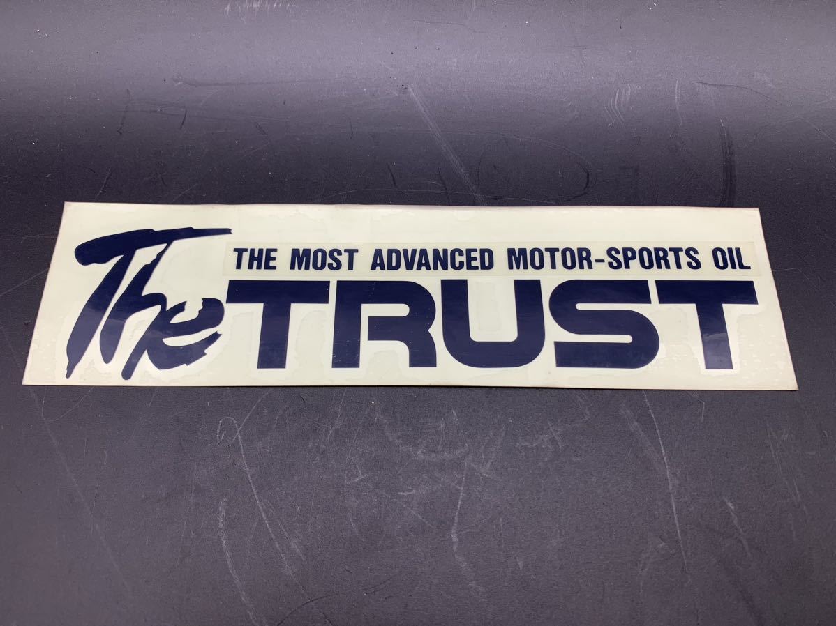 【The TRUST ステッカー】トラスト GReddy グレッディ/入手困難/当時物 サイズ:ヨコ245mm タテ66mm/色:紺色★新品未使用★ロゴステッカー _画像1