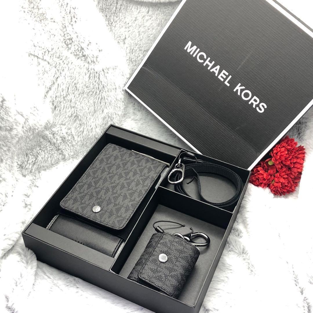 新品 Michael Kors マイケルコース 携帯 AirPodsケース 黒ブラック クロスボディ ショルダーバッグ メンズ モノグラム