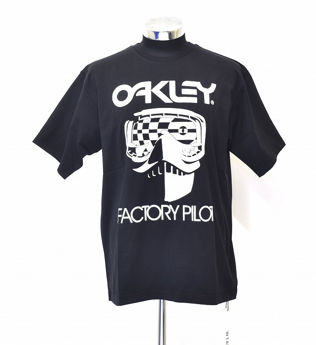 WTAPS（ダブルタップス）FACTORY PILOT. DESIGN SS 06 TEE COTTON OAKLEY（オークリー）191OJOKD-CSM01 BLACKOUT 半袖Tシャツロゴ コラボ