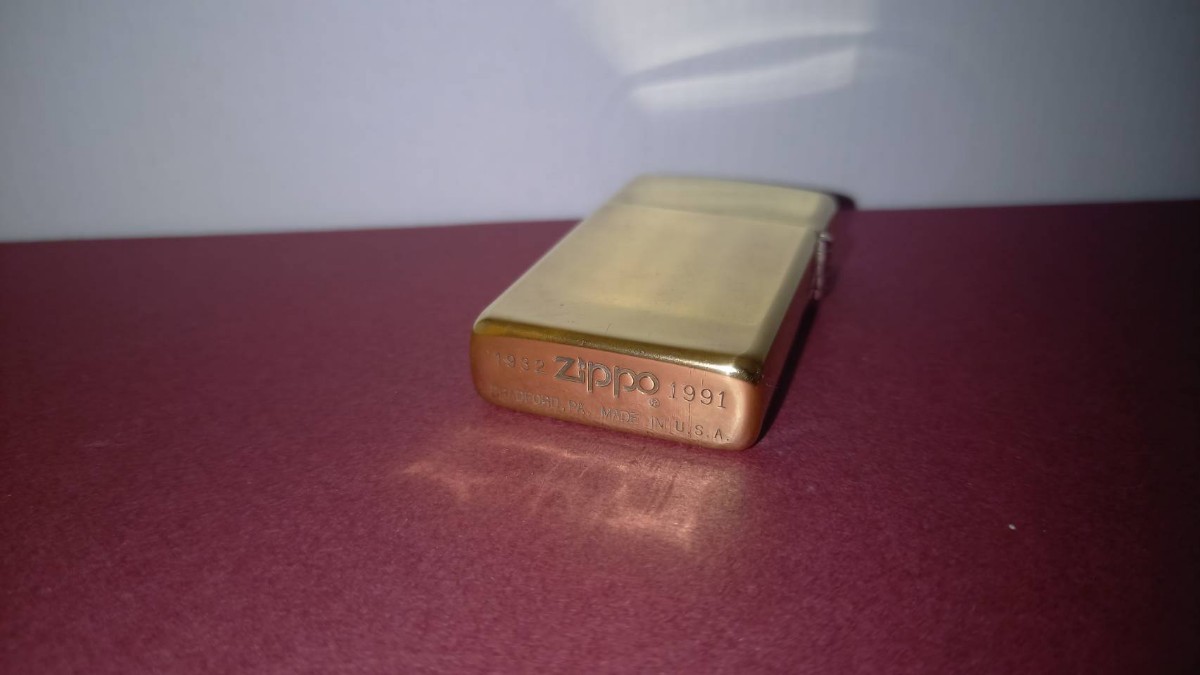 ZIPPO ジッポー 1991年 ソリッドブラス SOLID BRASS 無地 スリム ダブルイヤー 1932-1991 中古 オイルライター プレーン 　真鍮_画像2