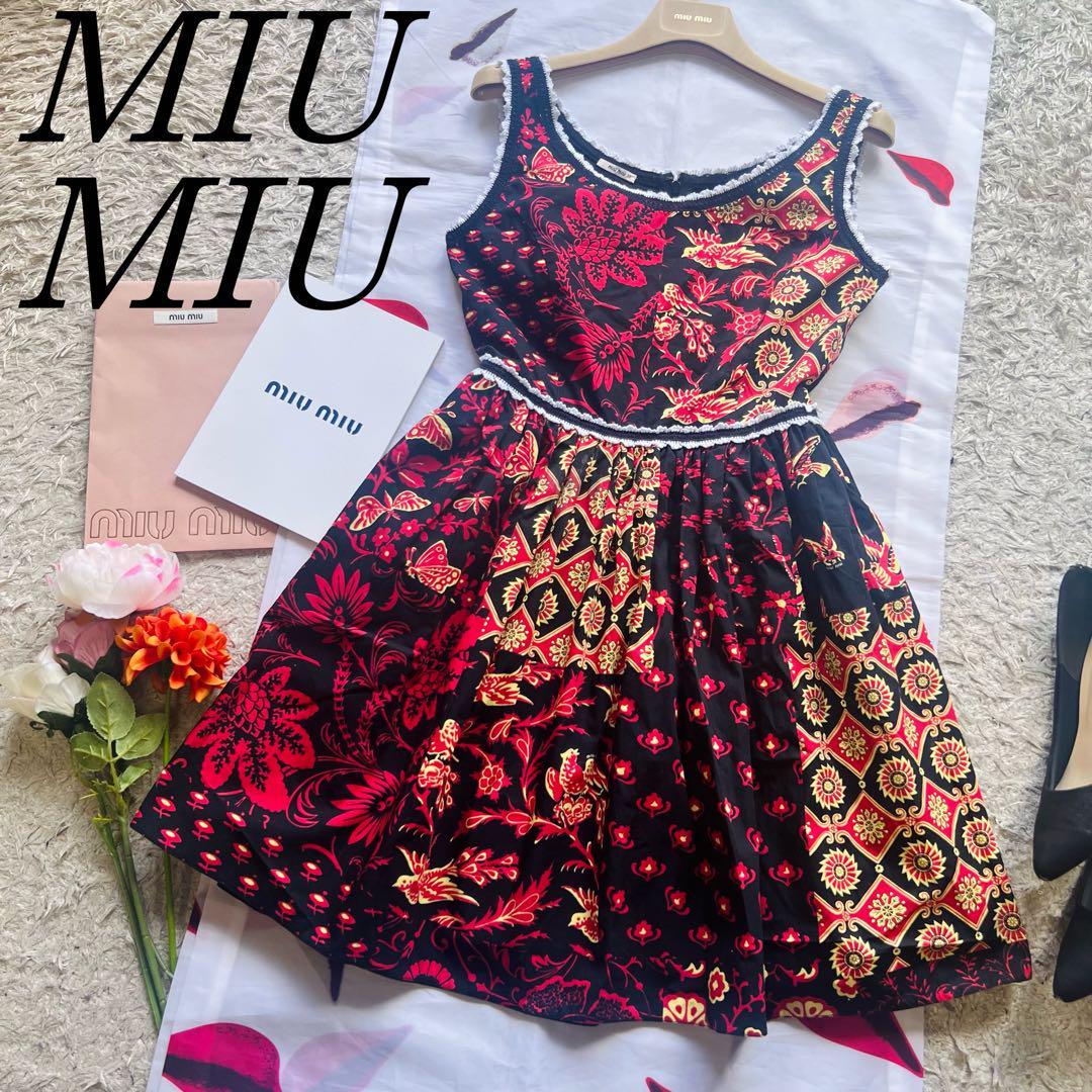 良品】MIU MIU 膝丈フレアワンピース 総柄 ノースリーブ 38 ブラック