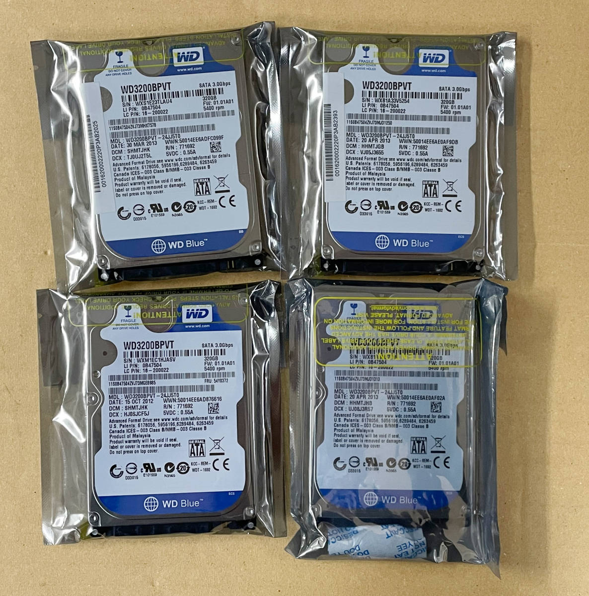 1円スタート WESTERN DIGITAL WD Blue 2.5内蔵HDD 320GB 4台セット WD3200BPVT SATA 5400rpm 8M 　未開封_画像1