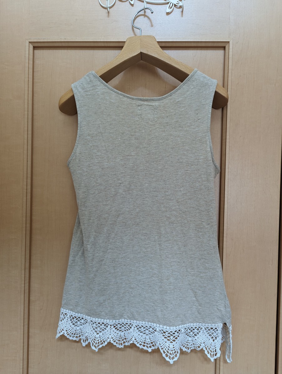  size M* lady's *cloudnine* beige. hem race tank top * postage included 