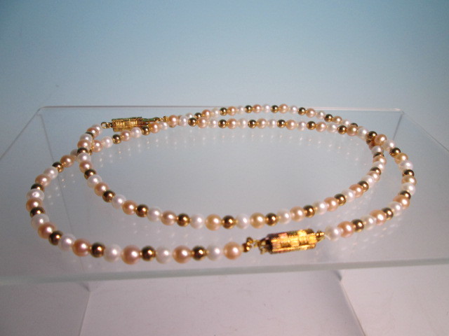 * close iron SILVERbook@ pearl. two color necklace & bracele in set case attaching 