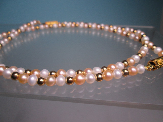 * close iron SILVERbook@ pearl. two color necklace & bracele in set case attaching 