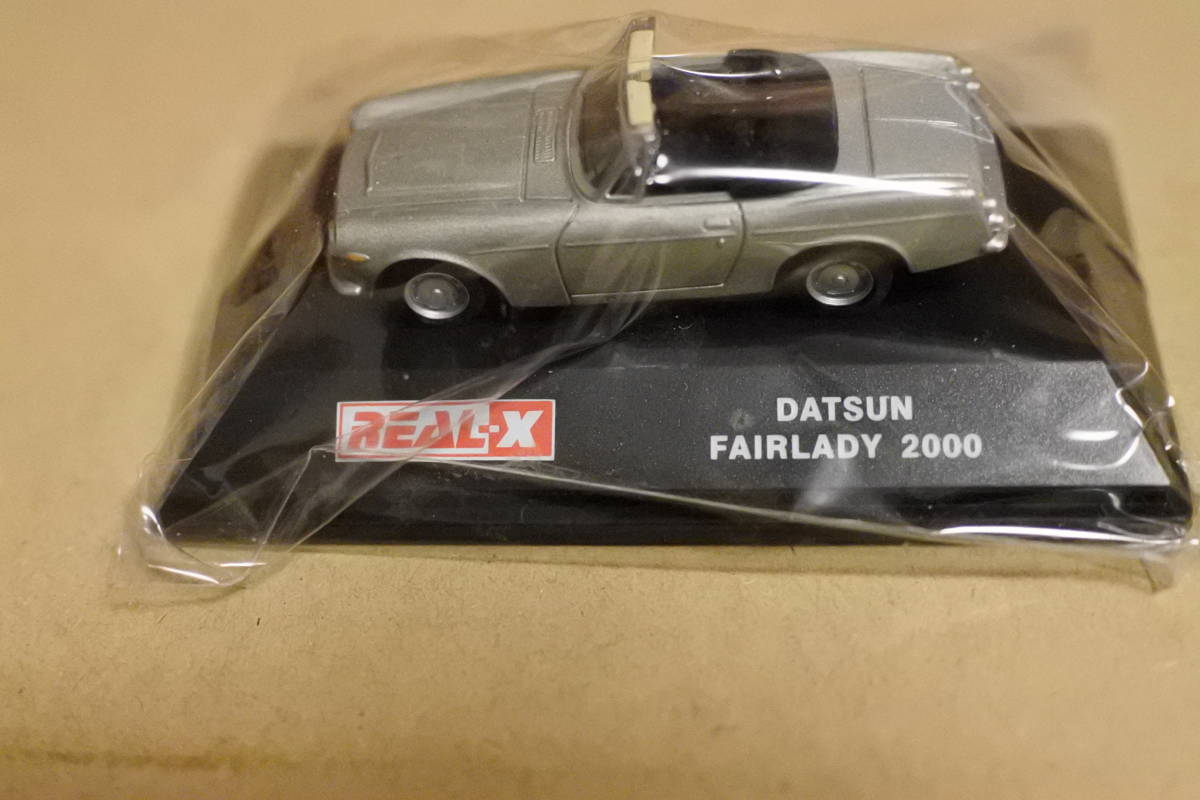 REAL-X Datsun Fairlady Z 2000 серебряный не использовался товар 