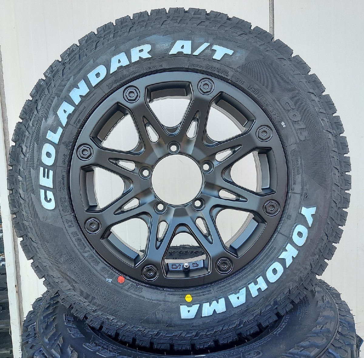 4本セット ジムニー JB23 JB64 JA22 JA12 JA11 BDX08 ヨコハマ ジオランダーAT 185/85R16 タイヤホイールセット 16インチ ホワイトレター_画像5