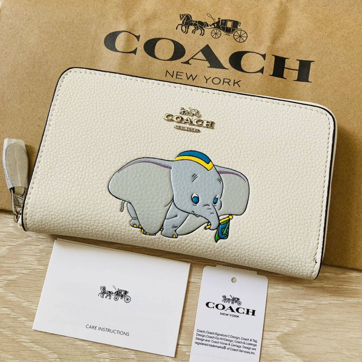 ☆ COACH コーチxディズニー限定コラボ　長財布　F88671 ダンボ　二つ折り財布　ミディアムジップウォレット ★ラ