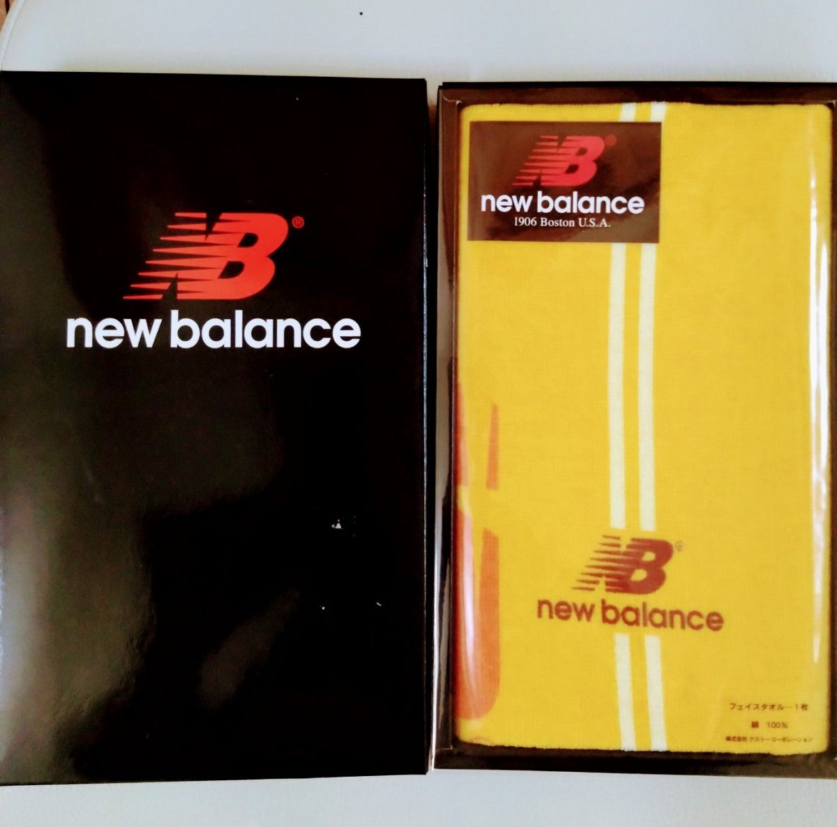 最終値下げ・New Balance,フェイスタオル・ギフト箱入。size約→34×74cm.未使用品。オレンジカラー。