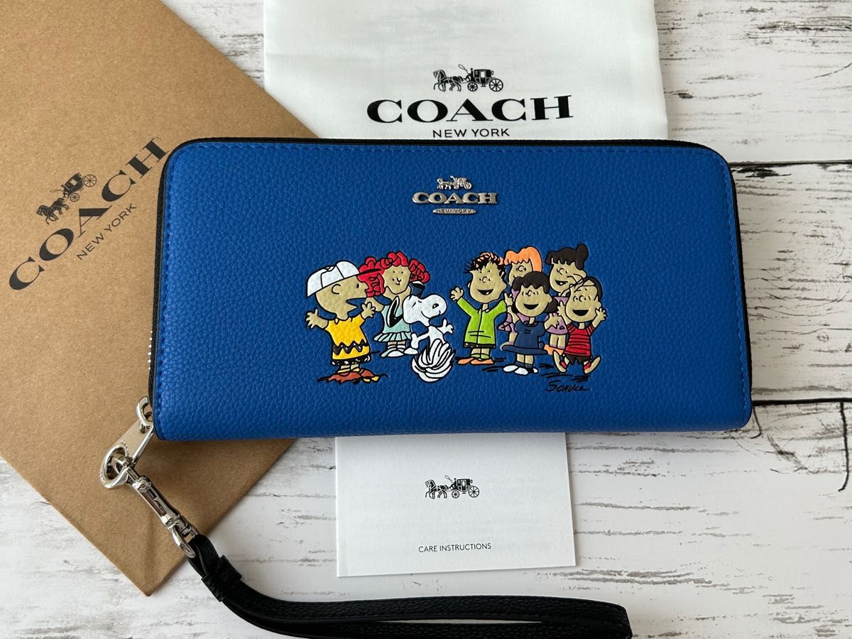 新品未使用】COACH コーチ長財布 スヌーピーブルーストラップ付き