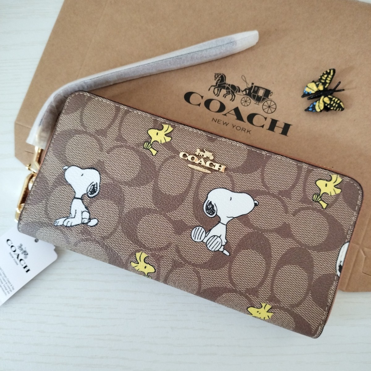豊富な新品 COACH - コーチ スヌーピー ピーナッツ 財布 ウォレットの
