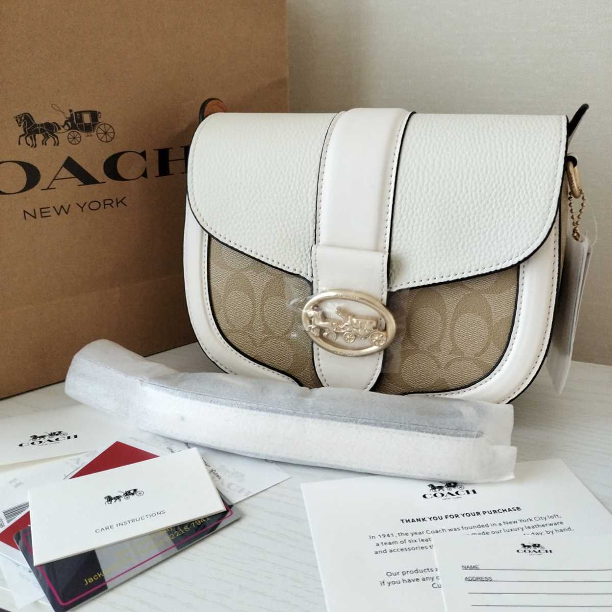 新品COACH ショルダーバッグ 白 ジョージ サドルバッグ 贈り物にも