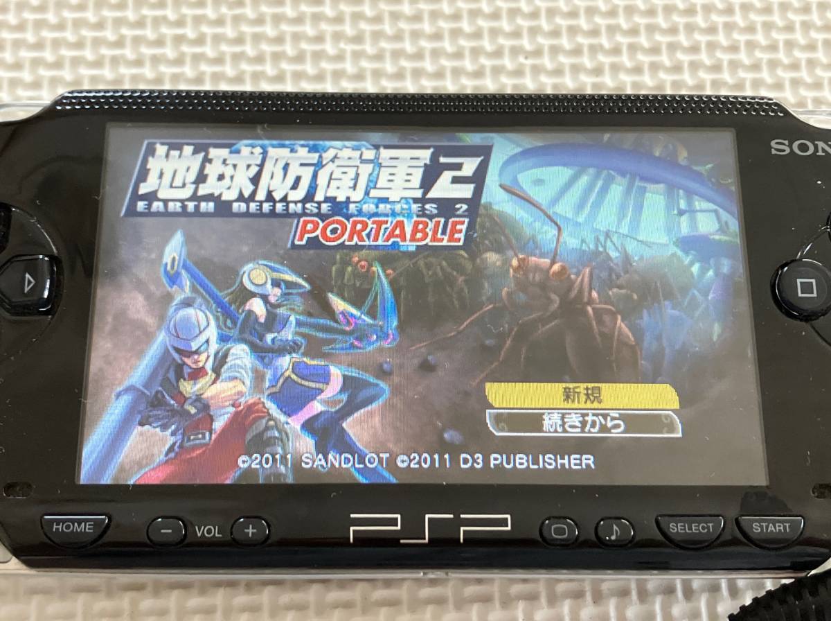 23-PSP-45　プレイステーションポータブル　地球防衛軍2ポータブル　ジャンク動作品　PSP　☆ディスクのみ_画像1