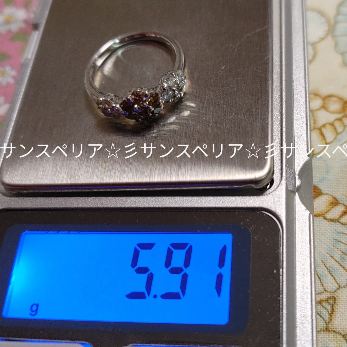 Pt900 クリアブラウンカラーダイヤモンド1ctフラワーデザインリング｜PayPayフリマ