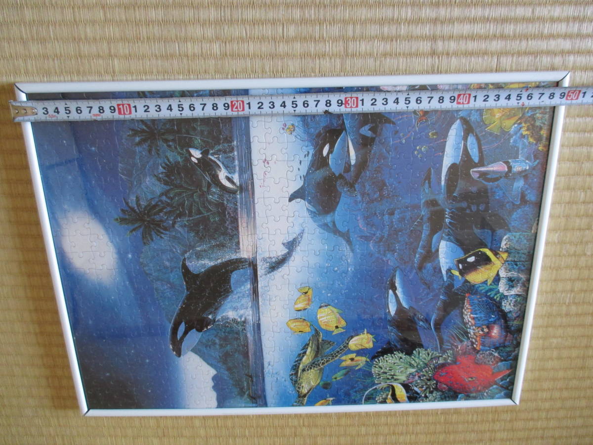 Christian lasen puzzle final product amount attaching dolphin Christian Riese Lassen