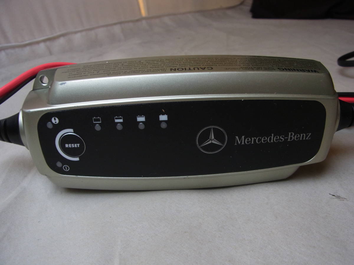 **[.] consigning goods Mercedes * Benz battery charger almost unused condition excellent **