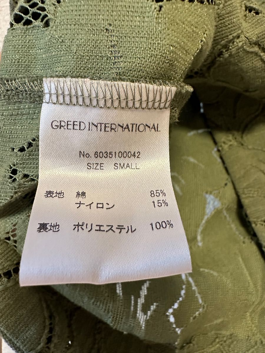 greed international カーキカットソー レーストップス