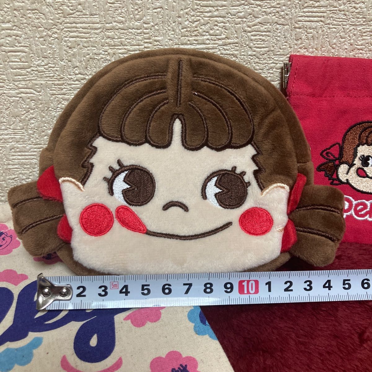 不二家ペコちゃん フェイスポーチ&巾着 小銭入れ|PayPayフリマ