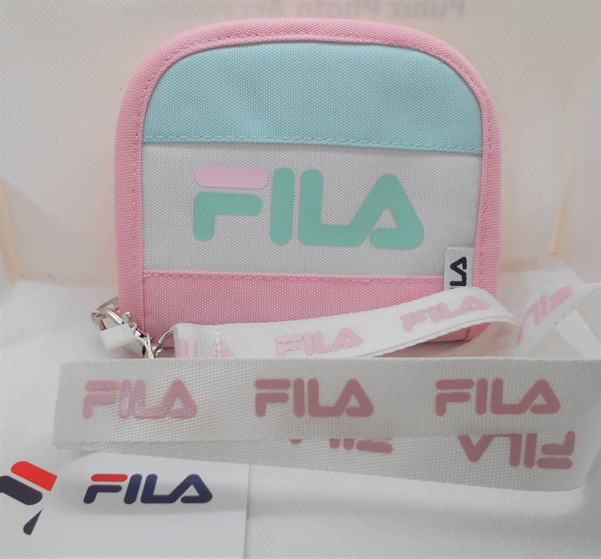 [ new goods ]FILA round wallet folding twice purse pink with strap men's lady's Kids 