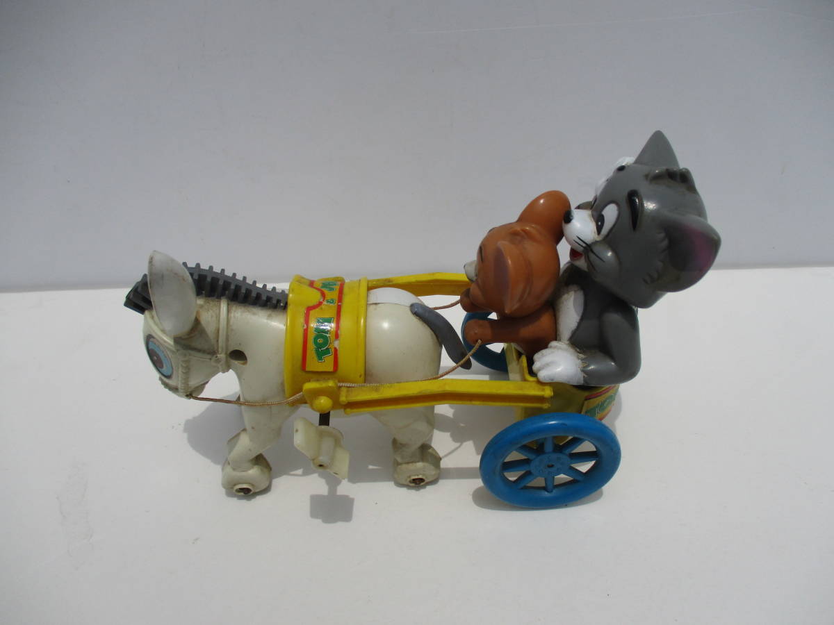 E02-182 secondhand goods Tom . Jerry spring mechanism. horse car toy 