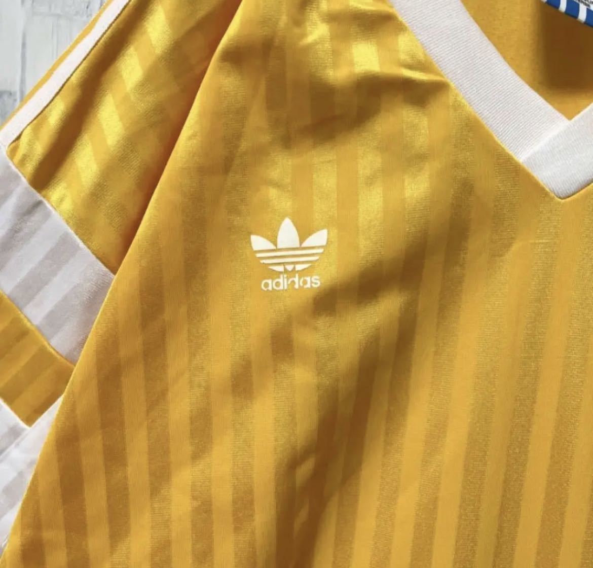 adidas オールド アディダス ゲームシャツ リンガーＴシャツ ユニフォーム サッカーシャツ 90s L イエロー 半袖 万国旗タグ USA製  3ライン