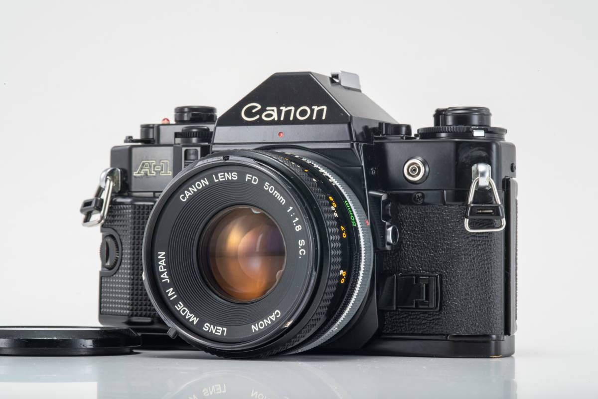 153CANON A-1 35mmフィルムカメラ w/ 旧FD F1 8/50mm S C マニュアル