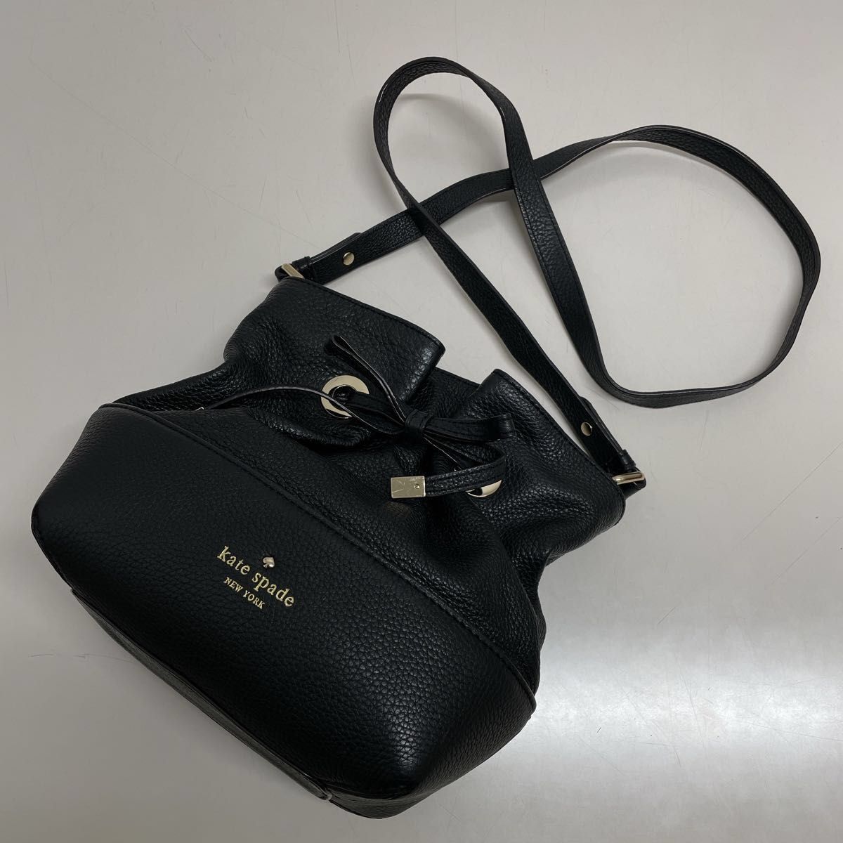 ケイトスペード Kate Spade ショルダーバッグ レザー 巾着型 PWRU3377 肩掛け ポシェット リボン