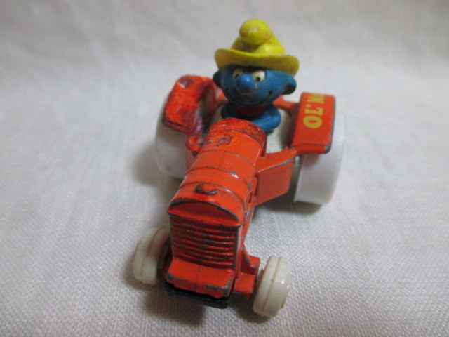 即決★USA製　ERTL　ヴィンテージ　SMURFS　スマーフ　ダイキャストカー・トラクター Farmer Ol McSmurf_画像1