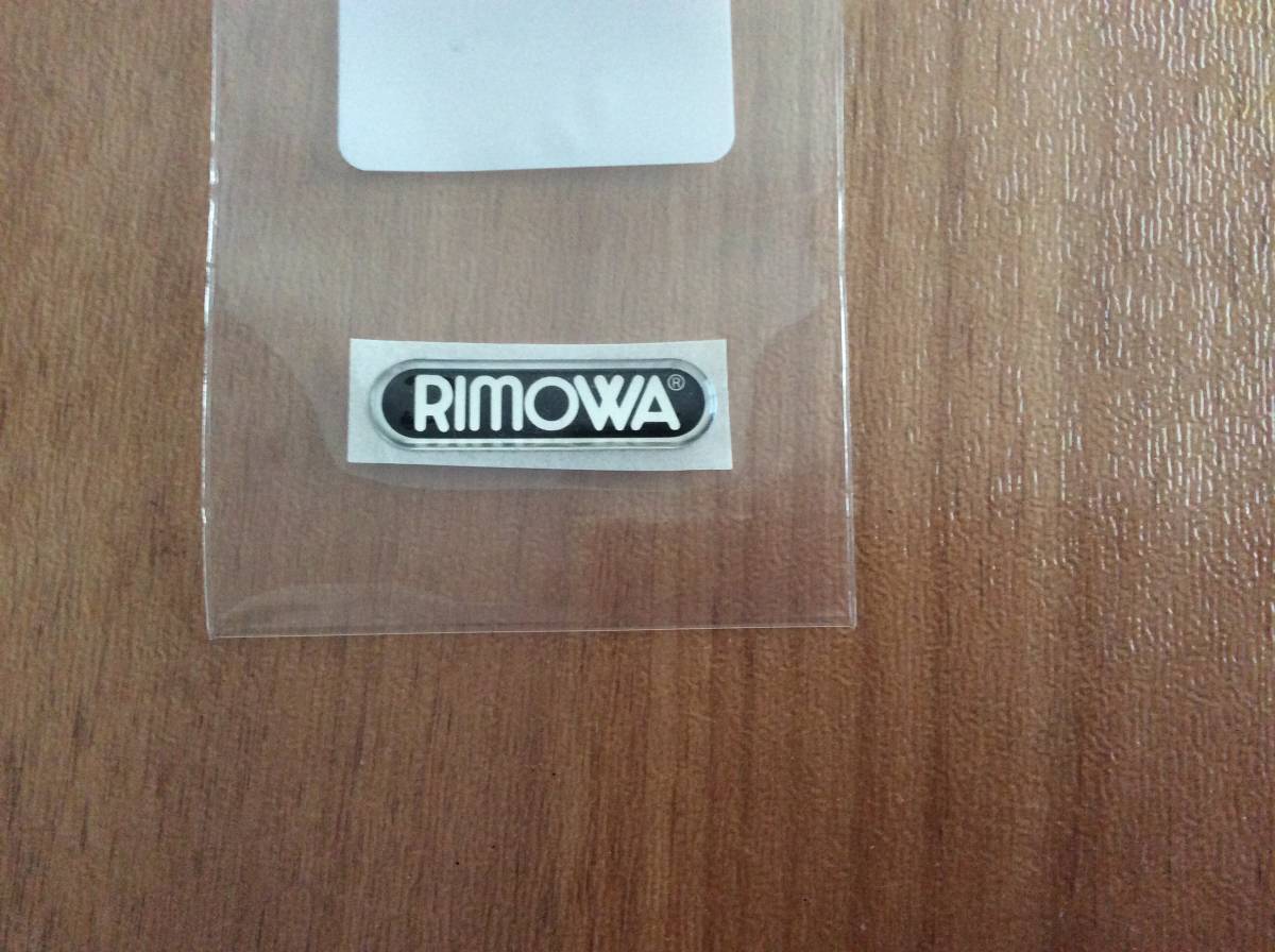 RIMOWA ロゴシール ブラック/シルバー 33mm x9mm 未使用_画像1