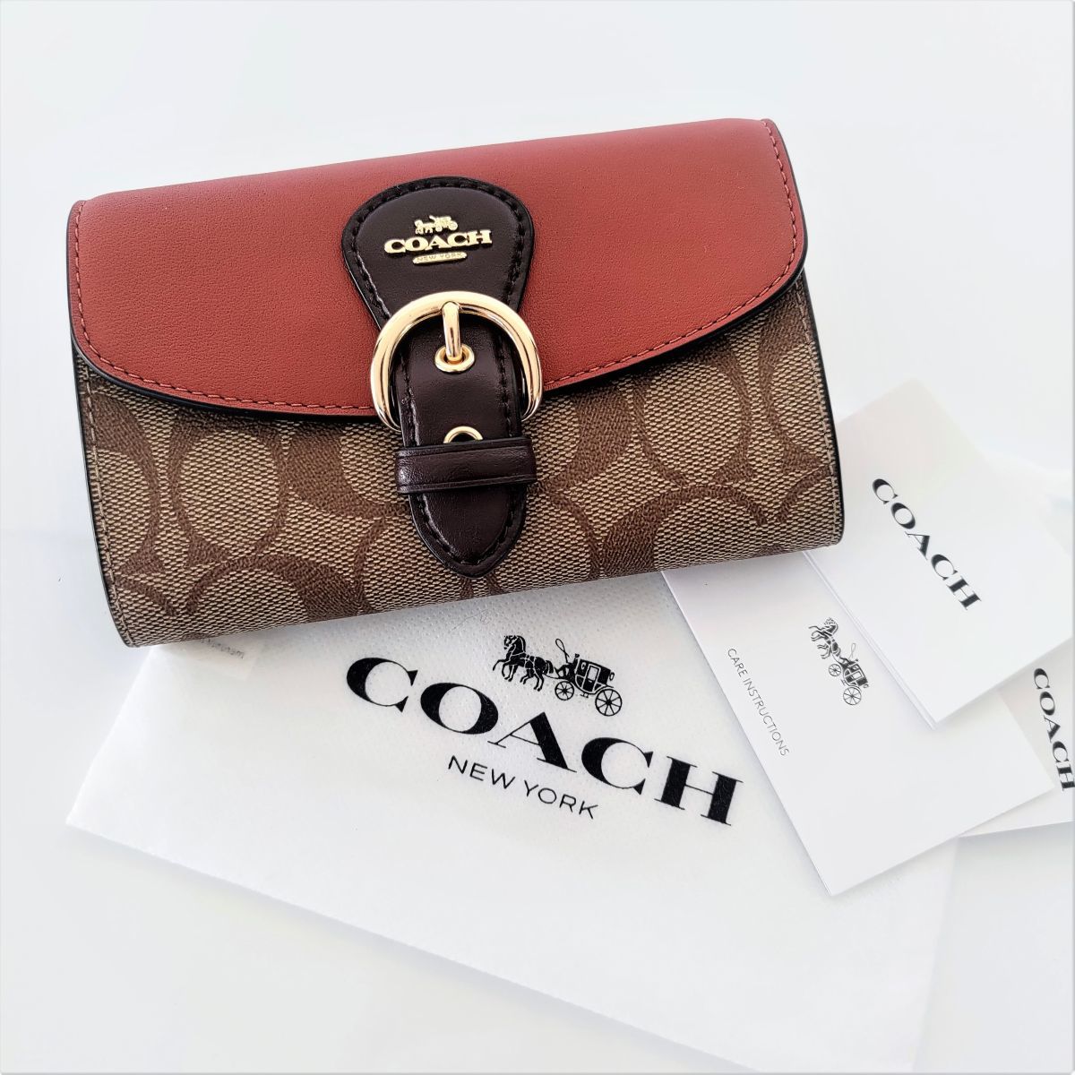 未使用】1円 極美品 タグ カード 保管袋付 COACH コーチ 二つ折り財布