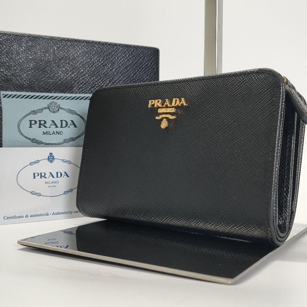 PRADA プラダ 二つ折り財布 サフィアーノレザー 金ロゴ ブラック 黒