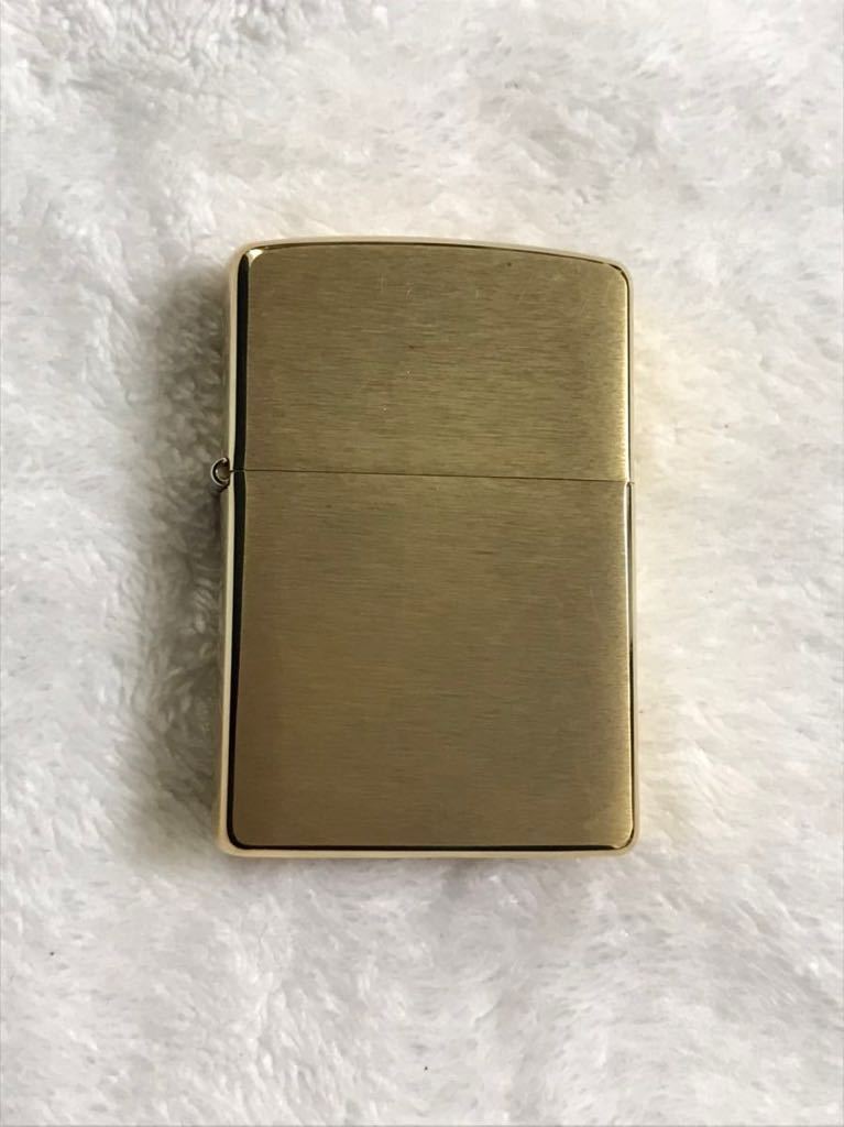 ZIPPO ジッポー SOLID BRASS ソリッドブラス オイルライター 2004年製 金色 ゴールド 未使用品_画像1