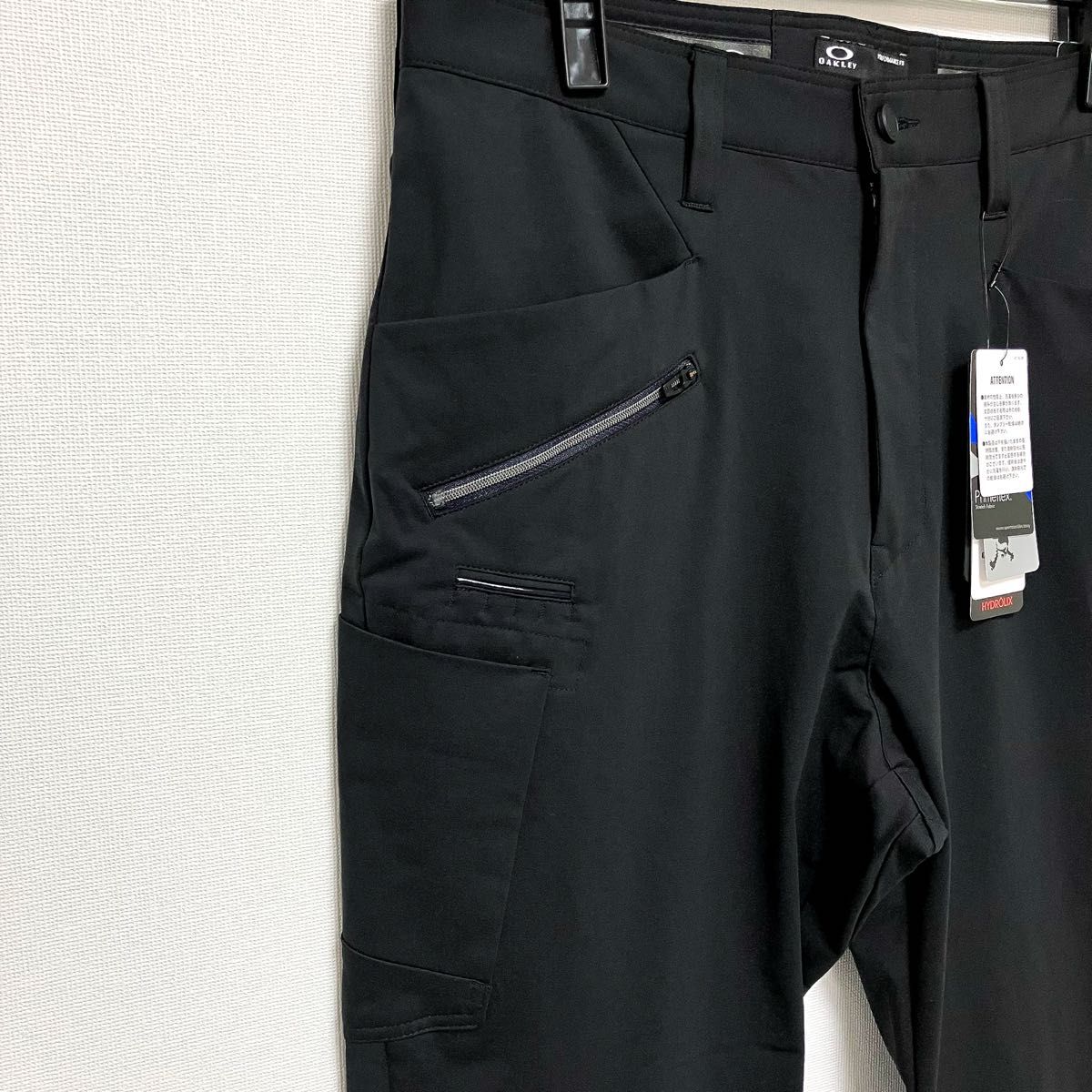 ★未使用★ OAKLEY オークリー スカル ストレッチ テーパードパンツ ジャガーパンツ ゴルフパンツ 34インチ Lサイズ