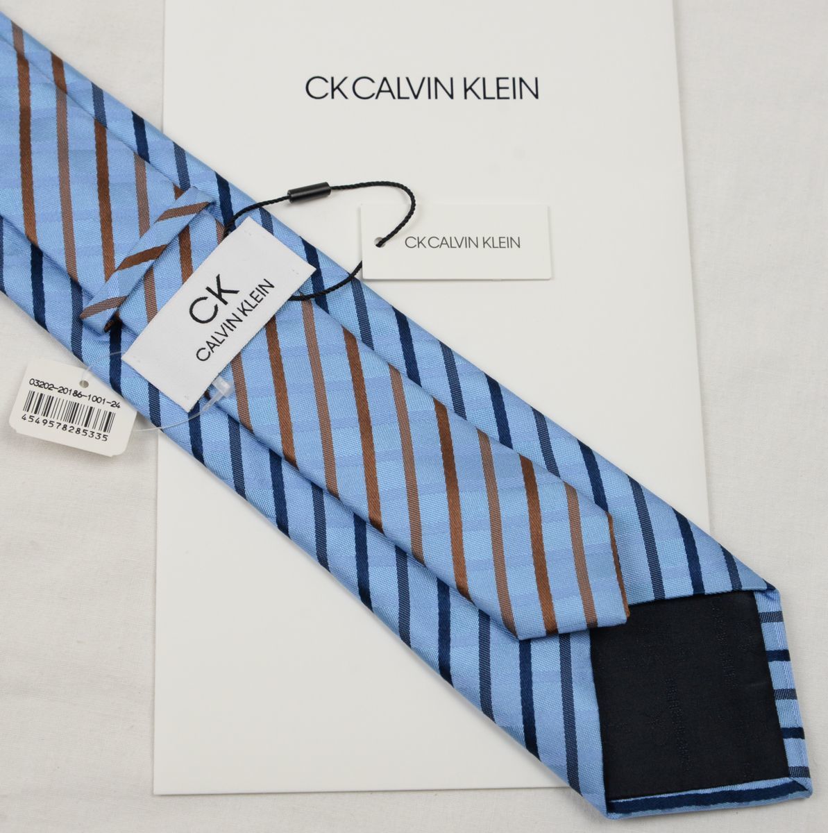 *CK Calvin Klein necktie ( stripe, sax . body * navy blue ash tea light brown line, made in Japan ) new goods 