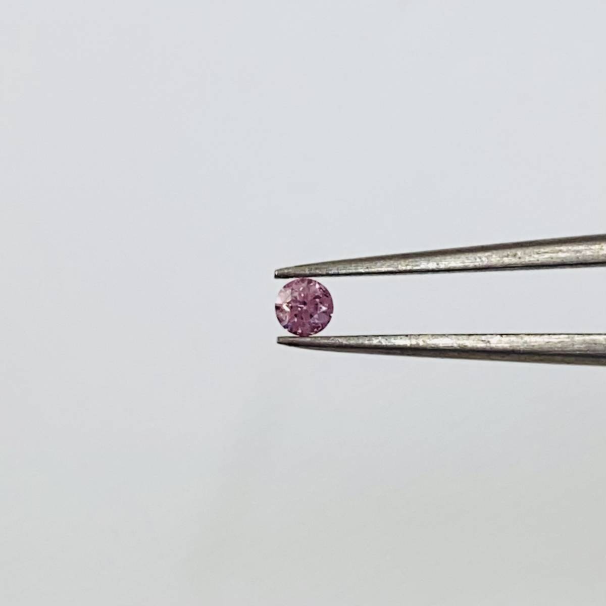 FANCY INTENSE PURPLISH PINK 0.039ct RD/RT2102/CGL | transparencia