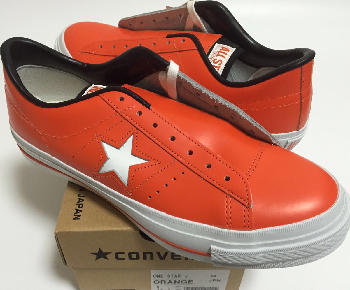 orange leather converse